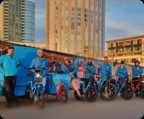 The Tyred team with branded cargo bikes, ready to come to you across London.